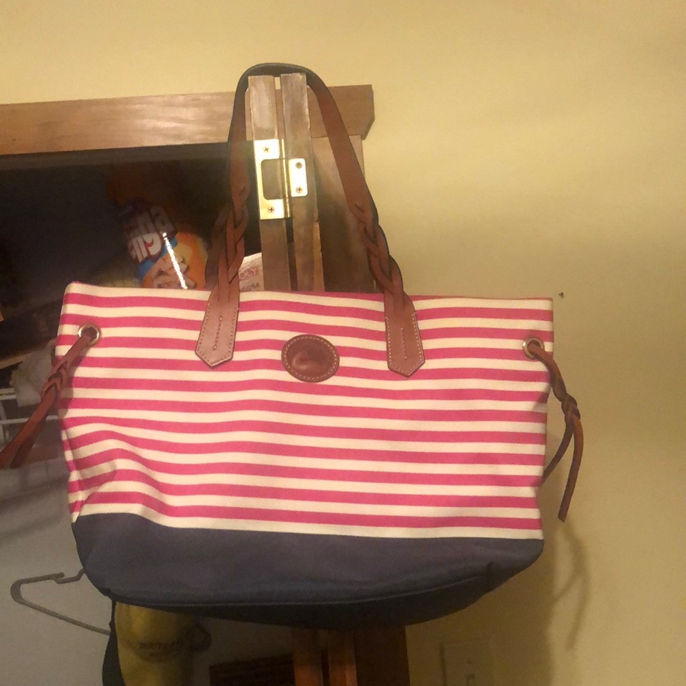 Excellent condition. Dooney Bourke. Smoke free home. No stains or wear marks.